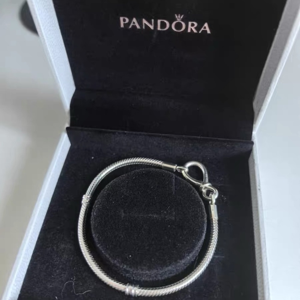 Authentic Pandora infinity knot charm Bracelet
